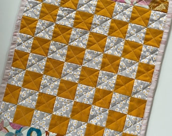 Handmade quilted travel checkers game