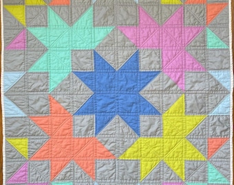 Colourful pastel and grey starry baby or lap quilt