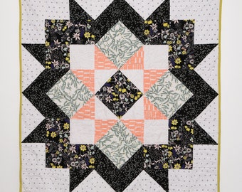 Black, white and floral starry baby or lap quilt