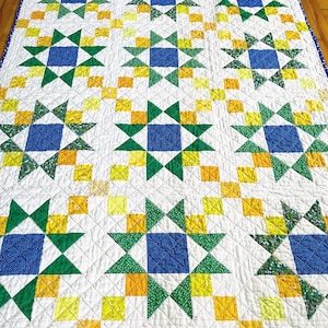 Bright cheerful springtime starry handmade patchwork quilt