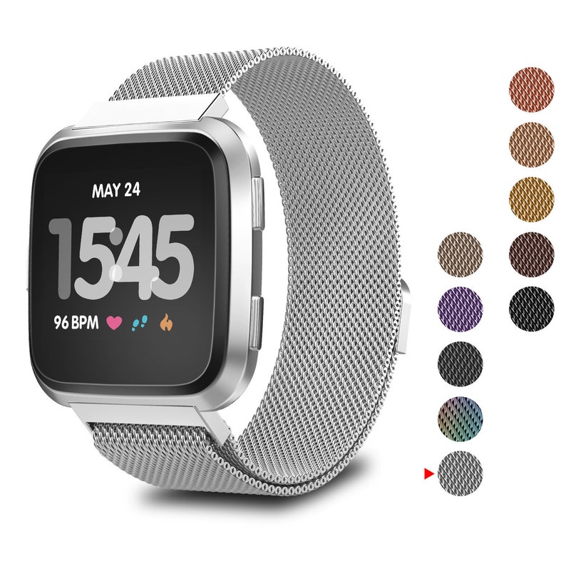 May include: Silver metal watch band with a silver watch face displaying the date "MAY 24" and the time "1545". The watch face also displays "96 BPM" and icons for heart rate, steps, and calories burned.