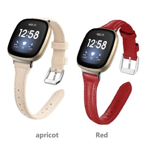 May include: Two smartwatch bands in different colors. The band on the left is apricot and the band on the right is red. Both bands have a gold-colored watch face with the time displayed as 12:58. The watch face also displays the day of the week, which is Wednesday, and the date, which is 23. The watch face also displays the heart rate, which is 78, and the steps taken, which is 1,359.