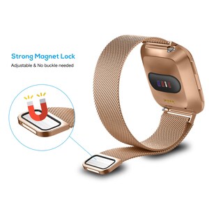 May include: A rose gold metal watch band with a magnetic clasp. The band is made of a fine mesh material. The watch band is shown on a white background.