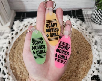 Portachiavi &quot;Film spaventosi e relax&quot;, portachiavi &quot;Motel di Halloween&quot; che si illumina al buio, portachiavi spettrale
