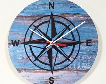 Nautical Compass 10" Wall Clock with blue gray weathered wood looking background