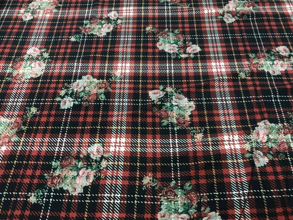 Tartan fabric jersey.Checkered red 