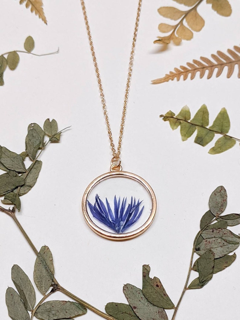 Handmade Blue flowers Floral gift Real pressed blue petals in gold circle pendant with chain Resin Pressed flower Cornflower necklace