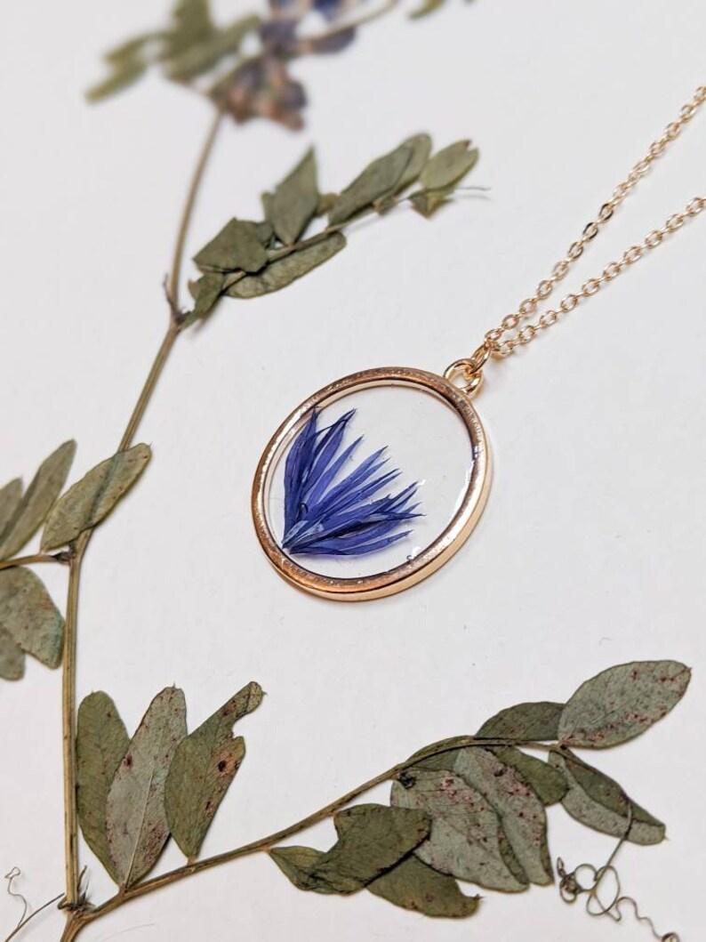 Handmade Blue flowers Floral gift Real pressed blue petals in gold circle pendant with chain Resin Pressed flower Cornflower necklace