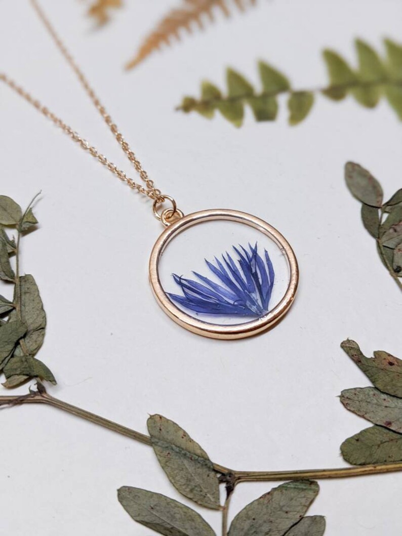 Handmade Blue flowers Floral gift Real pressed blue petals in gold circle pendant with chain Resin Pressed flower Cornflower necklace
