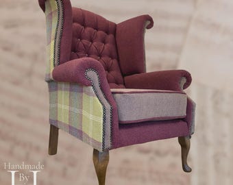 Chesterfield-style wingback chair, lovingly reupholstered to blend timeless elegance with contemporary charm