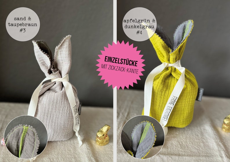 Puede incluir: Dos bolsas de regalo de Pascua de conejo de tela con una cinta blanca. La bolsa de la izquierda es de color gris claro con un borde de zigzag verde. La bolsa de la derecha es de color amarillo brillante con un borde de zigzag verde. Ambas bolsas tienen una etiqueta que dice "Fr&ouml;hliche Eiertage!" que se traduce como "&iexcl;Feliz Pascua!" en ingl&eacute;s.