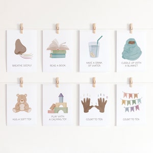 May include: Eight illustrated cards with calming activities for children. Each card features a different activity, such as breathing deeply, reading a book, having a drink of water, cuddling up with a blanket, hugging a soft toy, playing with a calming toy, counting to ten, and counting to ten.