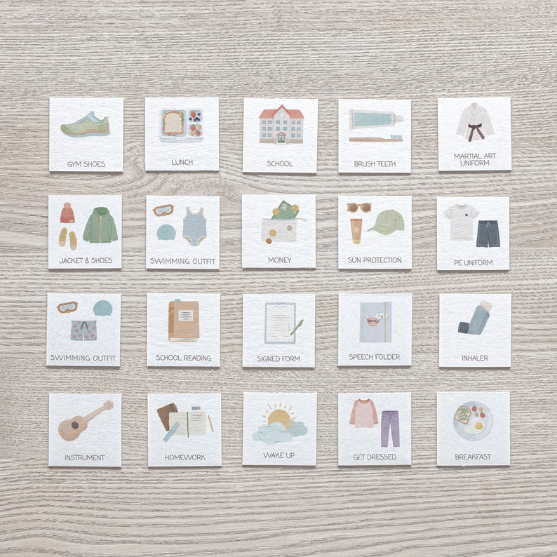 May include: A set of 20 illustrated cards with various school-related items, including gym shoes, lunch, school, brush teeth, martial arts uniform, jacket and shoes, swimming outfit, money, sun protection, PE uniform, swimming outfit, school reading, signed form, speech folder, inhaler, instrument, homework, wake up, get dressed, and breakfast.