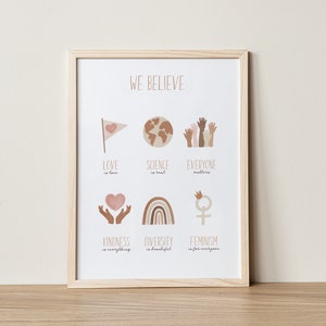 May include: A printable poster with the text "WE BELIEVE" at the top. The poster features six illustrations with text below each one. The illustrations include a heart with a flag, a globe, raised hands, a heart with hands, a rainbow, and a female symbol with a crown. The text below the illustrations reads "LOVE is love", "SCIENCE is real", "EVERYONE matters", "KINDNESS is everything", "DIVERSITY is beautiful", and "FEMINISM is for everyone".