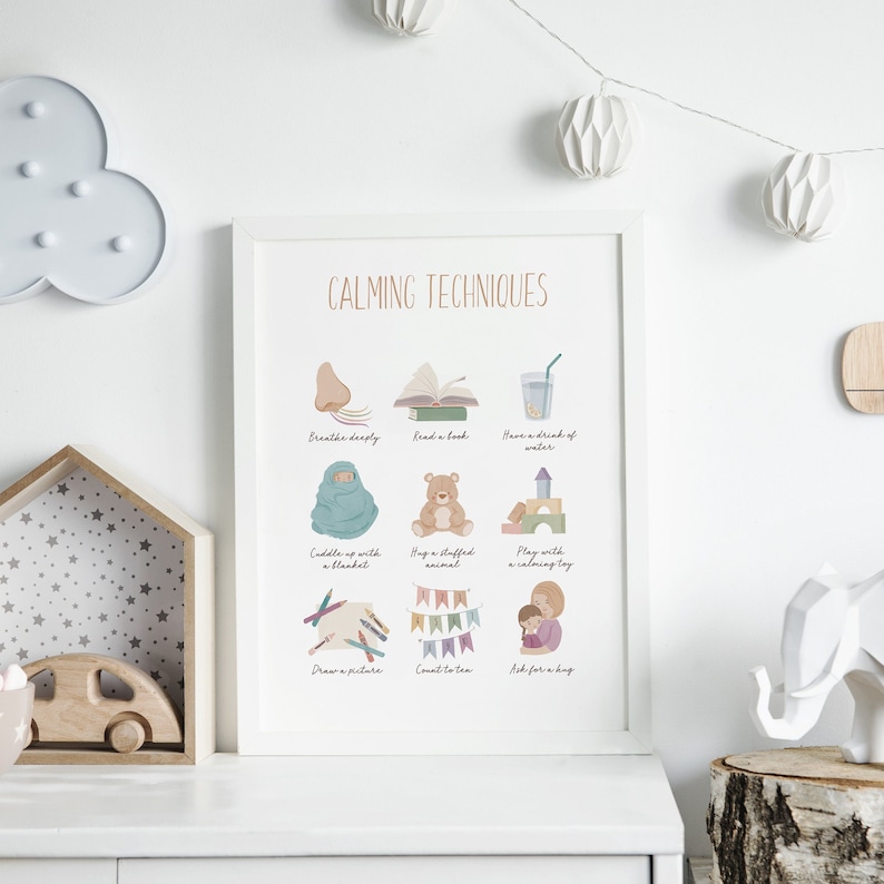 May include: A printable poster with illustrations of calming techniques for children. The poster features images of breathing deeply, reading a book, having a drink of water, cuddling up with a blanket, hugging a stuffed animal, playing with a calming toy, drawing a picture, counting to ten, and asking for a hug. The poster has a light pink background with a light brown title that says "Calming Techniques".