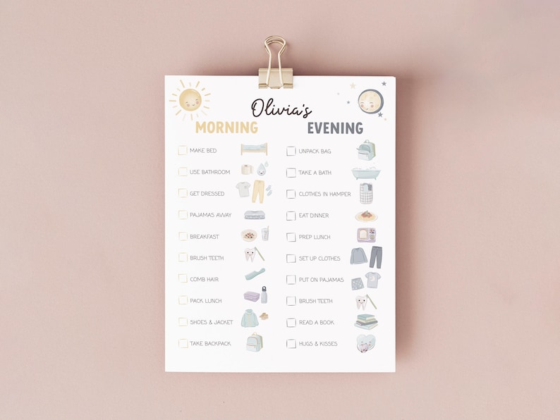 May include: A white checklist titled "Olivia's" with morning and evening routines, held by a gold paper clip. The list includes tasks like "Make Bed," "Brush Teeth," and "Read a Book," with corresponding illustrations.
