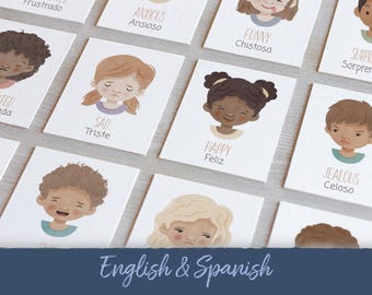 Könnte beinhalten: Ein Satz von Karteikarten mit illustrierten Gesichtern, die verschiedene Emotionen ausdrücken, mit den entsprechenden englischen und spanischen Wörtern für jede Emotion.