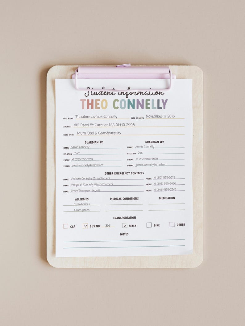 May include: A student information sheet on a wooden clipboard. The form includes the student's name, date of birth, address, and emergency contacts. The text "Student Information" is at the top in colorful letters.
