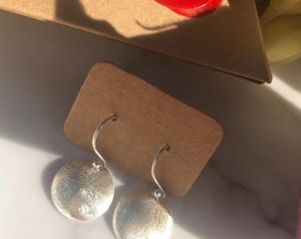 Brushed Sterling Silver Drop Earrings: Domed Circle Design