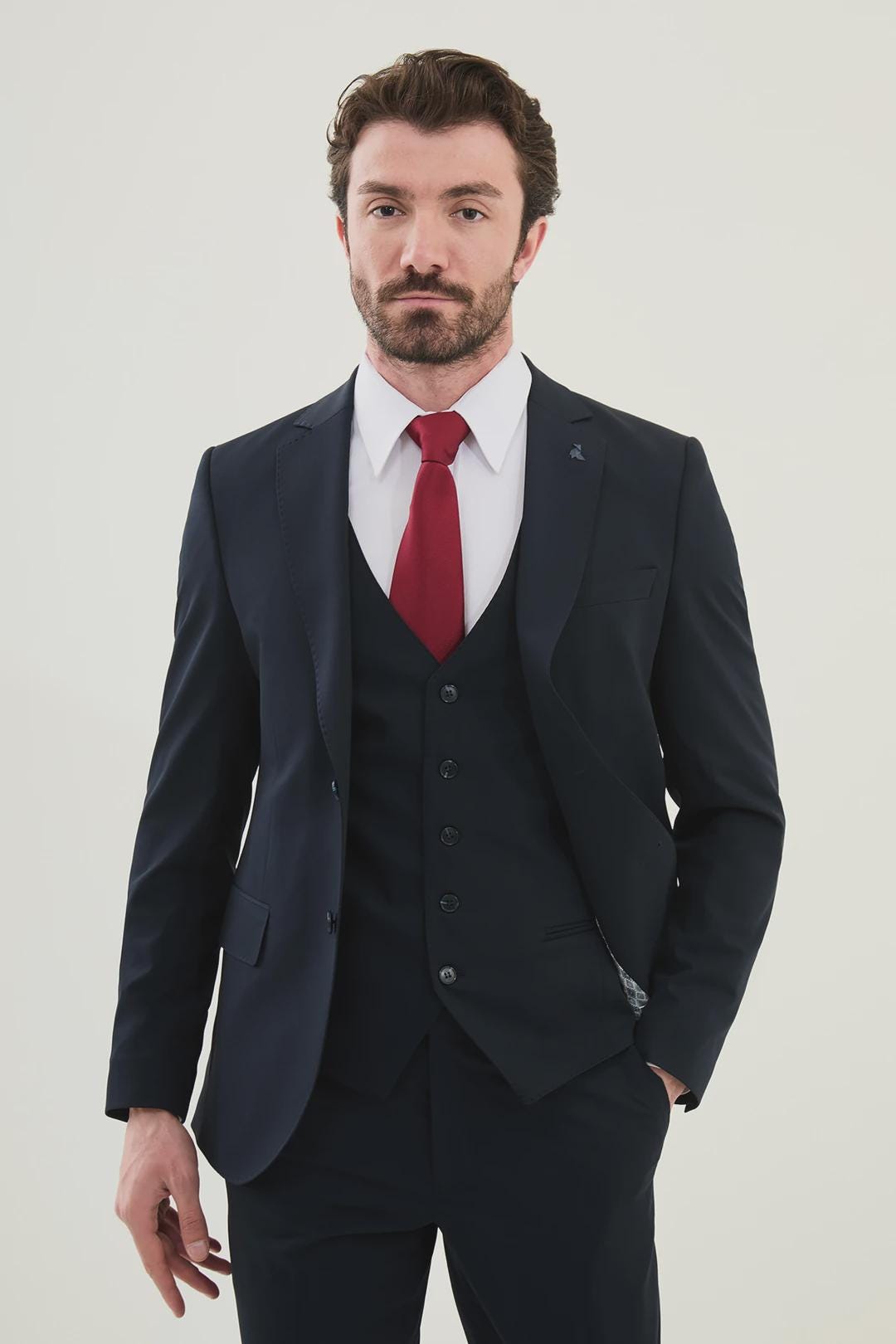 navy blue suit with red dress Cavani Connall main image 0