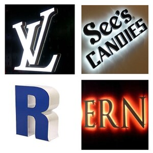 May include: Four different examples of illuminated signs. The first sign is a white "LV" logo. The second sign is white and says "See's CANDIES". The third sign is a blue "R" and the fourth sign is red and says "ERN".