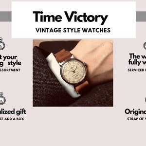 May include: A vintage style wristwatch with a white face and black hands, worn on a brown leather strap. The watch is on a person's wrist, with a gray suit jacket in the background. The text "Time Victory Vintage Style Watches" is at the top of the image.
