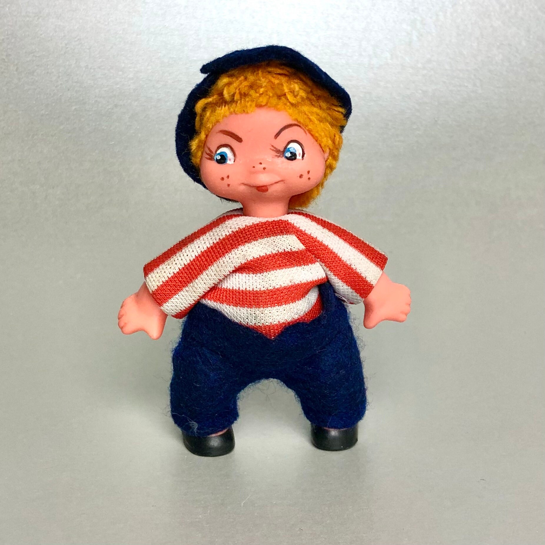 Vintage GDR Leipzig Mini Boy Doll, Hand Painted Face Yellow Hair Blue Eyes Native Costume Rubber Collectible Retro Toy, Gift for friend