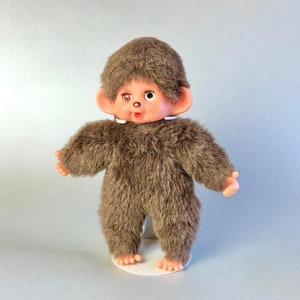 Peluche Kiki SEKIGUCHI Monchhichi Le petit panda noir et blanc 16 cm