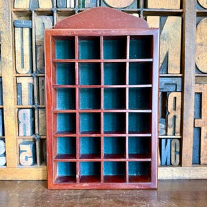 Wooden thimble display shelf, case. 24 compartments
