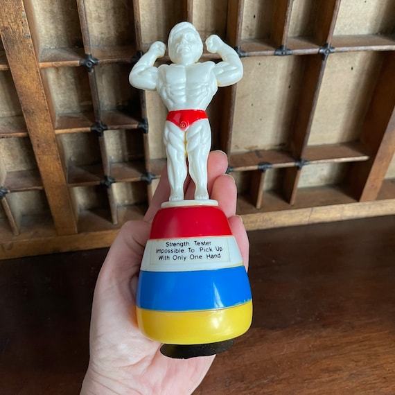 Vintage World Champion Squirt Strong Man Novelty Toy, in Original