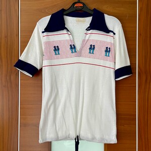 Vintage white t’shirt with blue collars and Japanese design. UK 8-10