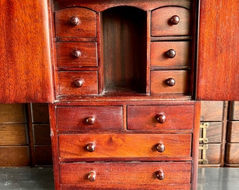 Beautiful vintage miniature dresser with 10 drawers. Restoration project