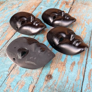 Set of four small black masquerade ball face mask with ribbon