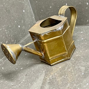 Miniature vintage faceted brass watering can.