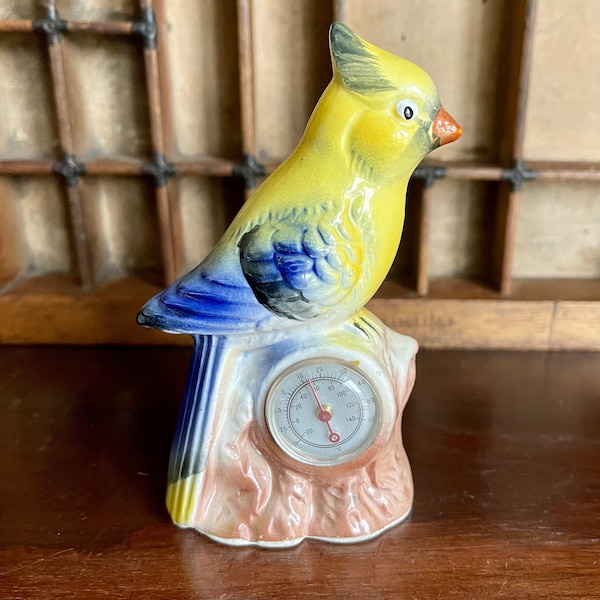 Vintage novelty thermometer weather station. Yellow and blue bird