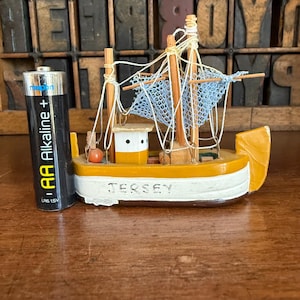 Miniature vintage mustard yellow wooden fishing boat, ship. Nautical decor, Jersey souvenir