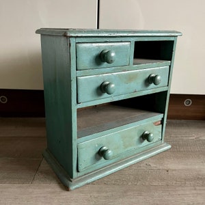 Vintage tabletop miniature chest of drawers for restoration