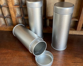 Cylindrical tinplate twist lid storage canister. 300ml. 55x148mm