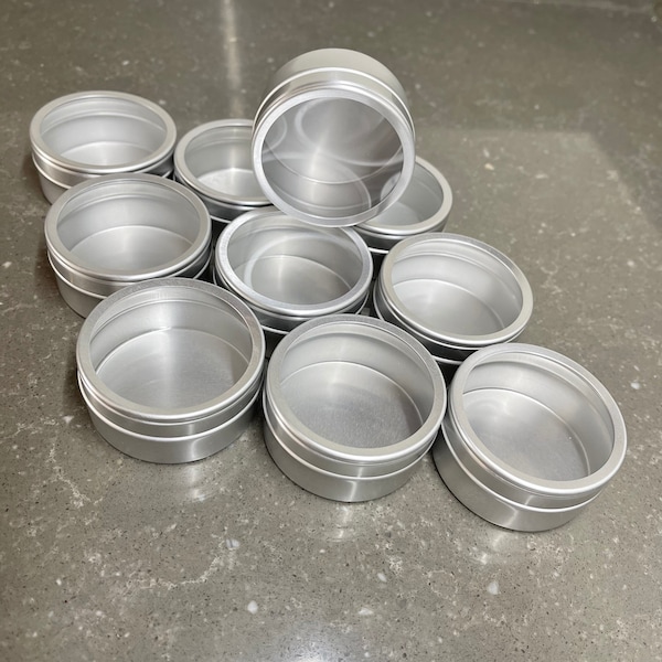 Small round metal gift tins with clear window slip lid. 52 x 25mm, 40ml