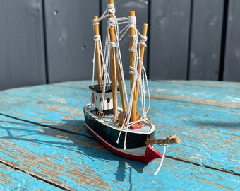 Vintage miniature wooden model fishing boat, ship