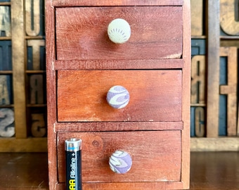 Small hardwood jewellery chest with three drawers