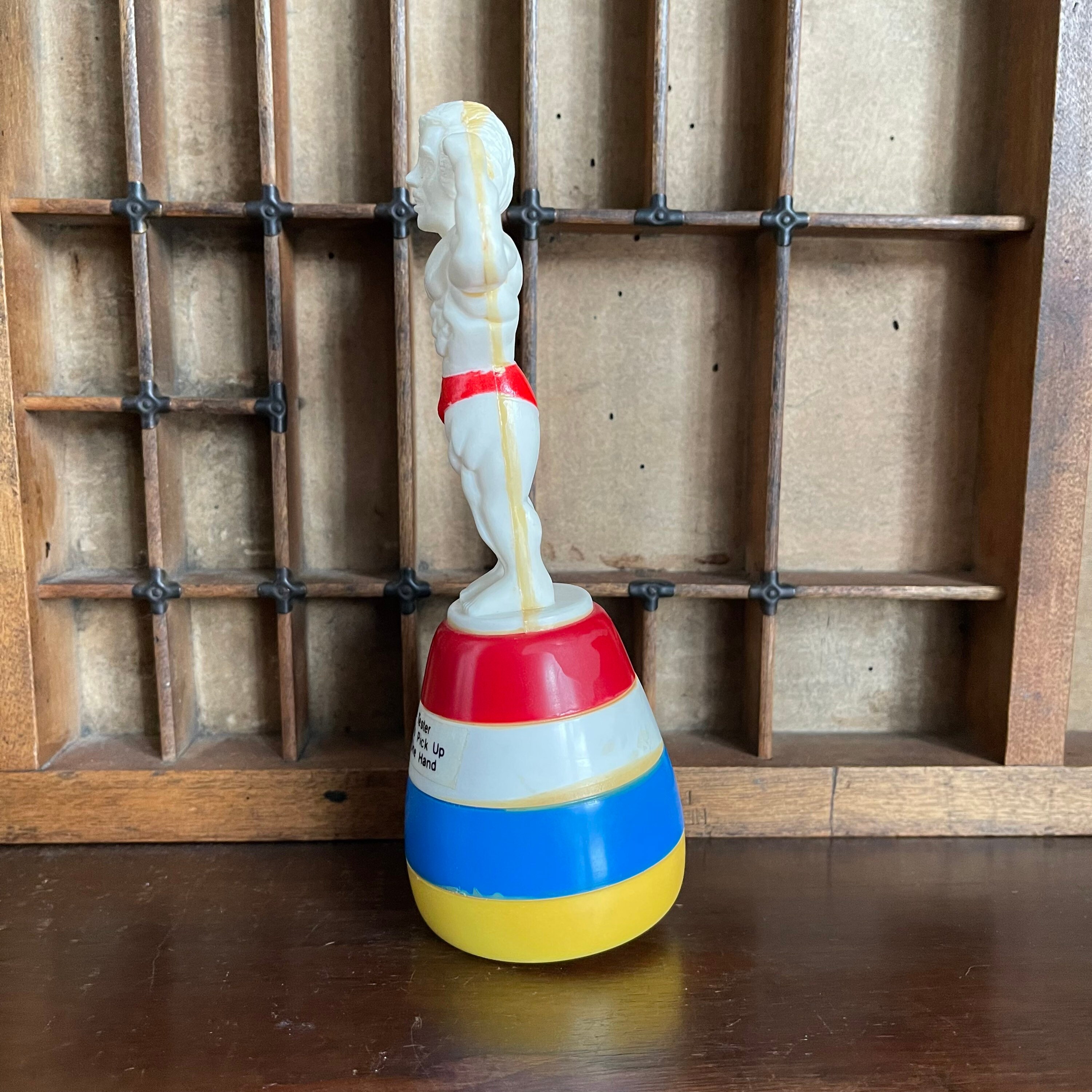 Vintage World Champion Squirt Strong Man Novelty Toy, in Original