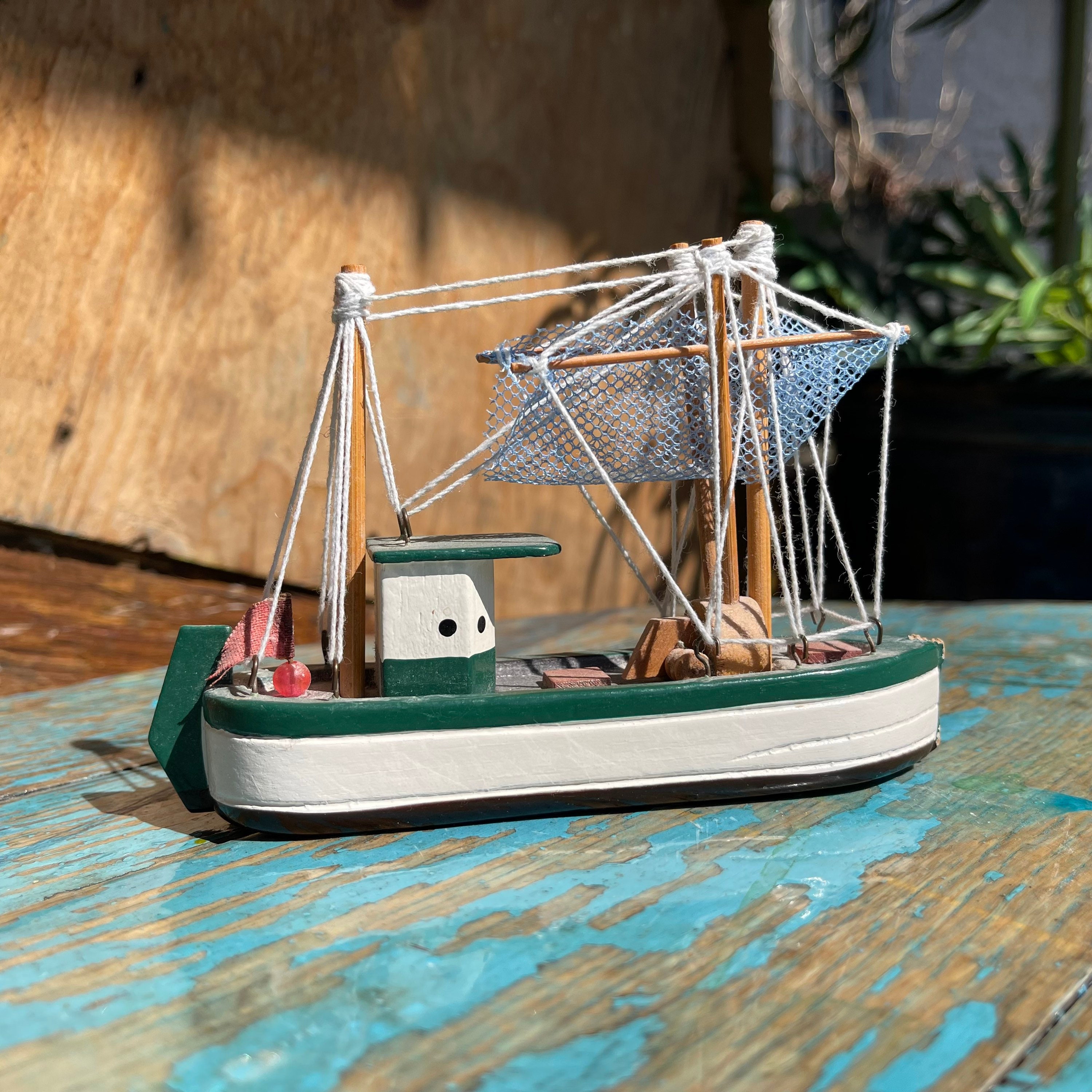 Small vintage wooden fishing boat, ship, boat ornament. Nautical decor