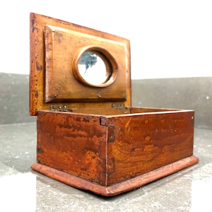 Vintage folk art style wooden box with carved lid and mirror