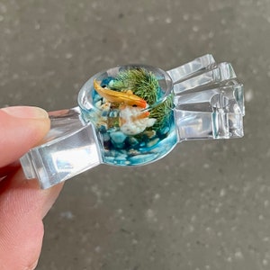 Handmade resin sweets with tiny aquarium scene