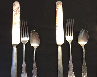 18 piece Silverware mismatched set of 6 table settings.