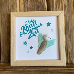 Guardian angel made of driftwood in a square wooden frame 16 x 16 cm