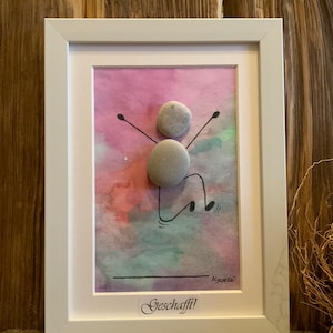 Klaar! Een leuke stenen foto met een aquarelachtergrond en een witte lijst van 15 x 20 cm