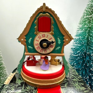 1992 Hallmark Enchanted Clock Magic Ornament QLX7274 Light Motion Works