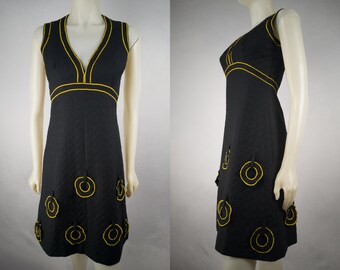 One of a kind 1960s vintage space age dress, black and yellow. Size medium, sleeveless, fully lined knee length dress